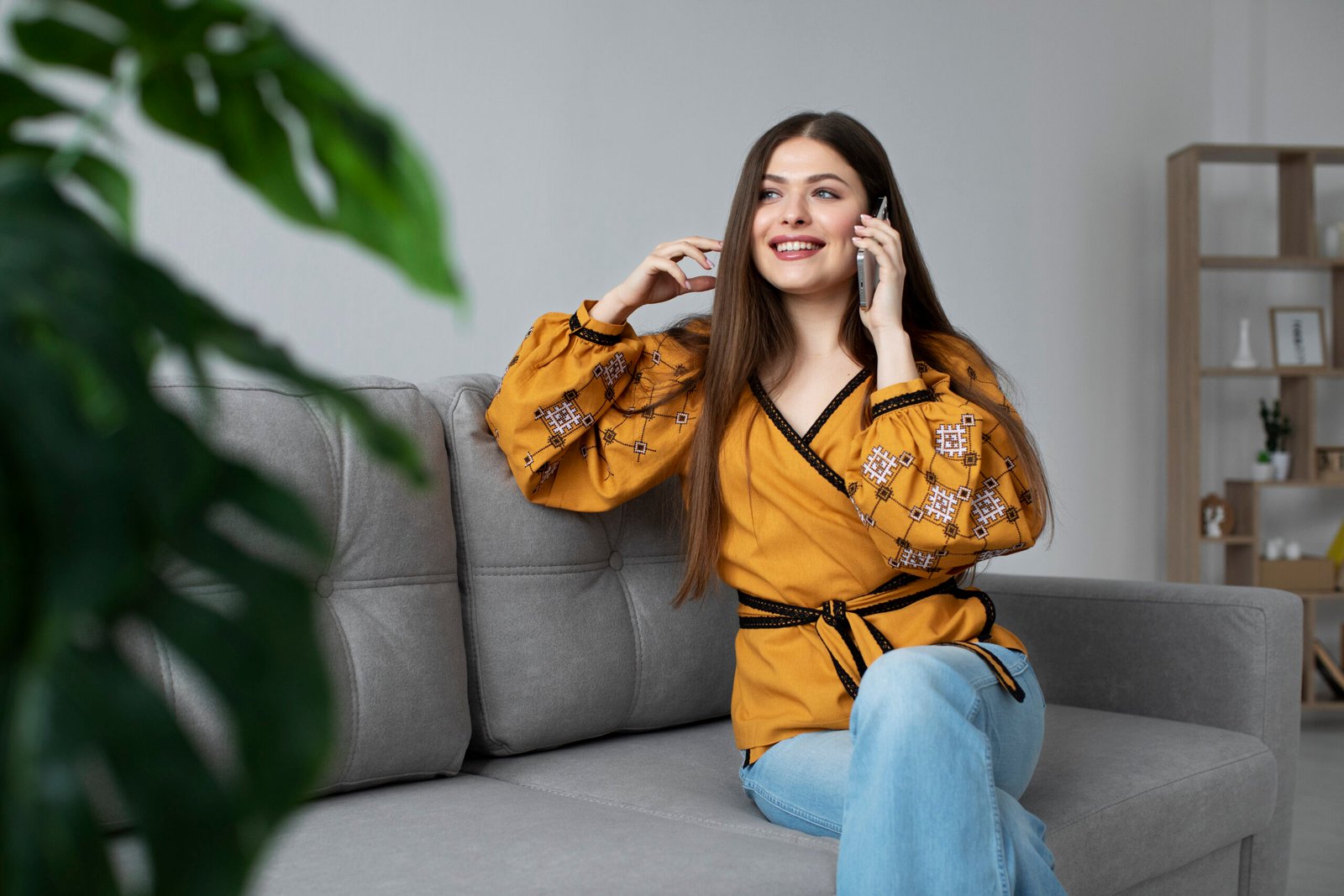 Woman sitting on a sofa